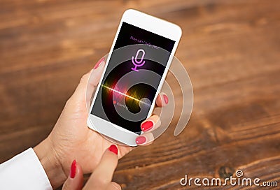 Voice assistant concept on mobile phone Stock Photo
