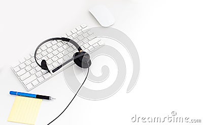 VOIP headset on laptop computer keyboard. Communication support for callcenter and customer service Helpdesk. Isolated on white Stock Photo