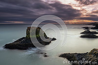 Volcanic cliffs and basalt rocks in Arnarstapi Stock Photo