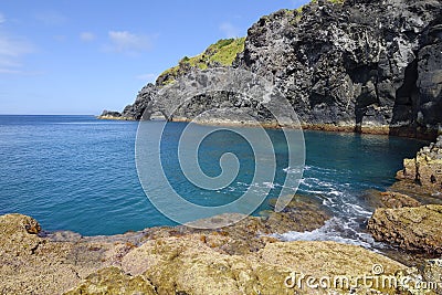 Volcanic cliffs of Santa Cruz das Flores Stock Photo