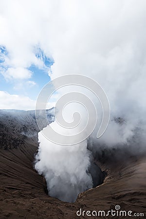 Volcanic eruption, close up on crater with smoke, Mount Bromo, Indonesia Stock Photo