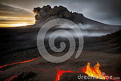 Volcanic eruption with lava flow and ash cloud Stock Photo