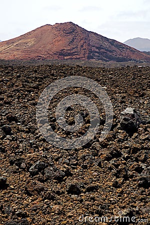 volcanic stone in los volcanes lanzarote rock sky hill summ Stock Photo