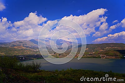 Volcano crater Birket Ram Rams pool and Mount Hermon Israel Stock Photo