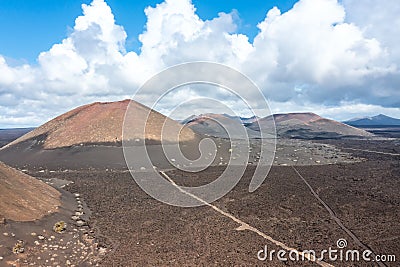 Volcanos in Timanfaya National Park on Lanzarote island aerial view on Canary Islands in Spain Stock Photo