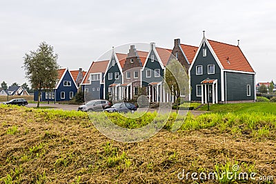 Volendam is a town in North Holland in the Netherlands. Colored houses of marine park in Volendam Editorial Stock Photo