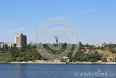 The Volga River. The ship is approaching Volgograd. The monument to Mother Motherland is visible in the distance. Stock Photo