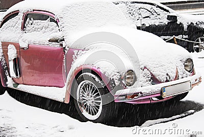 Volkswagen Beetle in the snow Stock Photo