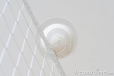 Volleyball ball over the net during match Stock Photo