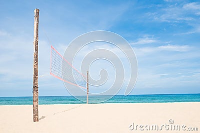 Volleyball net on empty sand beach Stock Photo