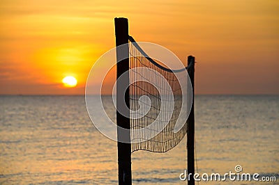 Volleyball net at sunset Stock Photo