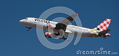 Volotea Airlines flies in the blue sky. Takeoff at Tenerife Airport Editorial Stock Photo