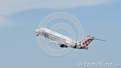 Volotea Plane flying up in the sky Editorial Stock Photo