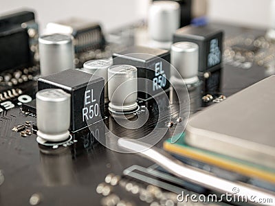 A voltage regulator module, VRM, processor power module, PPM, is a buck converter that provides microprocessor and chipset the ap Stock Photo