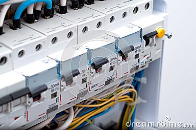 Voltage switchboard with circuit breakers. Electrical background Stock Photo