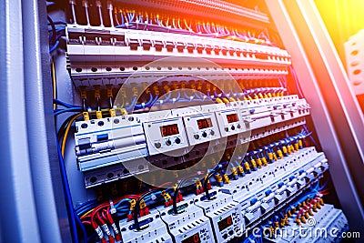 Voltage switchboard with circuit breakers. Electrical background. Stock Photo