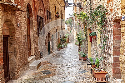 Volterra medieval town Picturesque houses Alley in Tuscany Italy Stock Photo