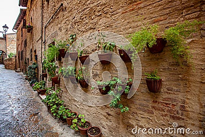 Volterra medieval town Picturesque houses Alley in Tuscany Italy Stock Photo