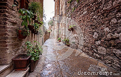 Volterra medieval town Picturesque houses Alley in Tuscany Italy Stock Photo