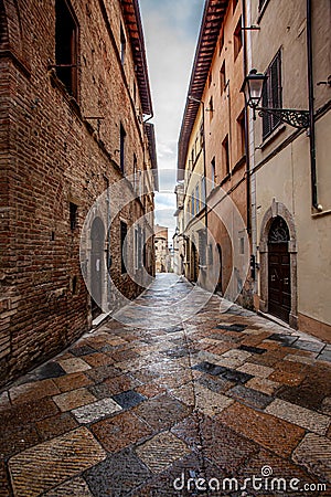 Volterra medieval town Picturesque houses Alley in Tuscany Italy Stock Photo