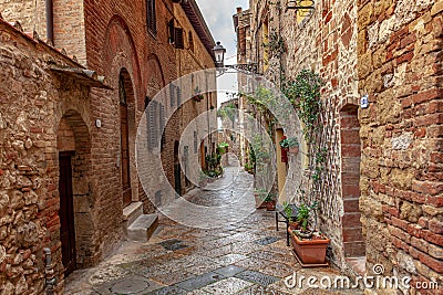 Volterra medieval town Picturesque houses Alley in Tuscany Italy Stock Photo