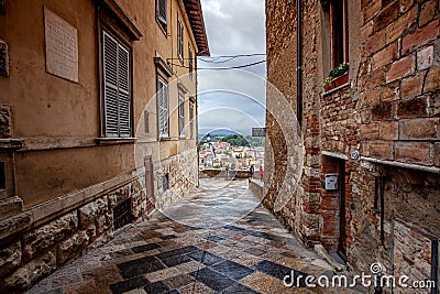 Volterra medieval town Picturesque houses Alley in Tuscany Italy Stock Photo