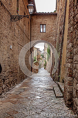 Volterra medieval town Picturesque houses Alley in Tuscany Italy Stock Photo