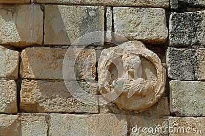 Figure, Triumphal Arch - Volubilis Roman City, Morocco Stock Photo