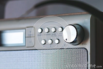 Volume knob in vintage radio. Technology communication background Stock Photo