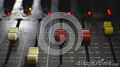 The volume of professional audio mixer in a radio broadcast Stock Photo