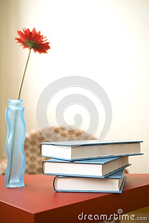Volumes on a red table Stock Photo