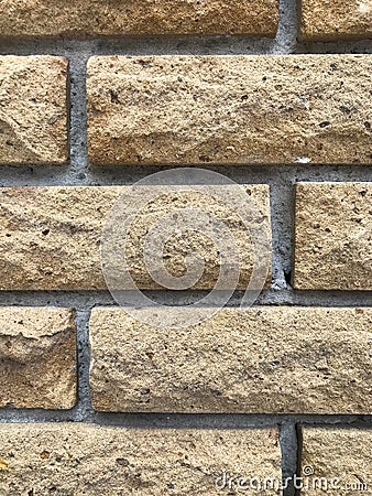 Volumetric bricks that protrude slightly from the wall Stock Photo