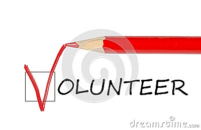 Volunteer message and red pencil Stock Photo