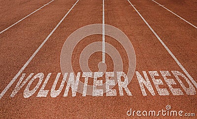 Volunteer Needed written on running track, New Concept on running track text in white colour Stock Photo