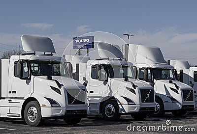 Volvo Semi Tractor Trailer Big Rig Truck display at a dealership. Volvo Trucks supplies complete transport solutions Editorial Stock Photo