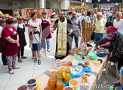 Priest at the celebration of Honey Savior of Central Voronezh Market Editorial Stock Photo