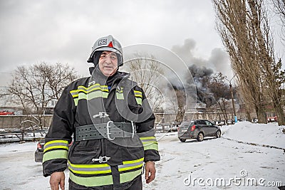 Voronezh, Russia - December 25: Fire in an industrial warehouse on Lantenskaya Street, rubber is burning, lots of smoke and flames Editorial Stock Photo