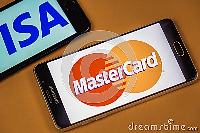 VORONEZH, RUSSIA - 3 may, 2019: Visa logo and mastercard logo on two different phones Editorial Stock Photo