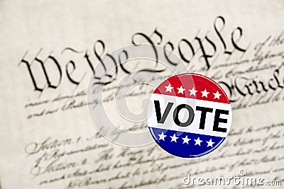 Vote badge and constitution Stock Photo