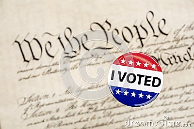 Vote badge and constitution Stock Photo