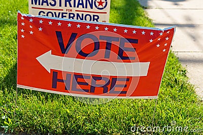 Vote Here Directional Sign Editorial Stock Photo