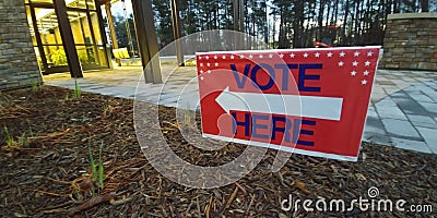 Vote Here sign for election day Stock Photo