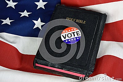 Vote pin on Holy Bible Stock Photo