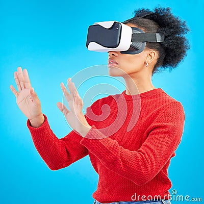 VR, metaverse and digital glasses with woman and video gaming for augmented reality. Studio, female person and blue Stock Photo