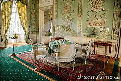 Vranov nad dyji, Southern Moravia, Czech Republic, 03 July 2021: Castle interior, baroque wooden carved furniture, green guest Editorial Stock Photo