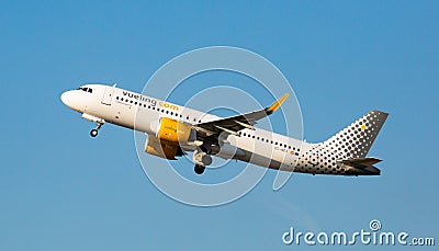 Vueling airliner EC-NDA taking off from El Prat Airport Editorial Stock Photo