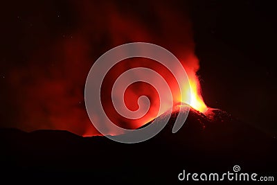 Etna volcano during an eruption with lava explosion from the crater Stock Photo