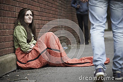 Vulnerable Teenage Girl Sleeping On The Street Stock Photo