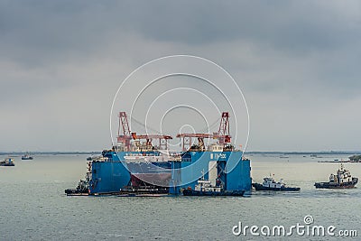 Closeup of floating dry dock at entrance of Tau River, Vung Tau city, Vietnam Editorial Stock Photo