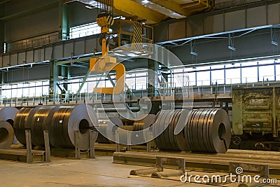 Vyksa, Russia: 12.23.2018. Traveling crane on a hot rolled strip steel product warehouse. Finished metal casting and rolling in a Editorial Stock Photo